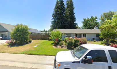 T K Roofing Inc